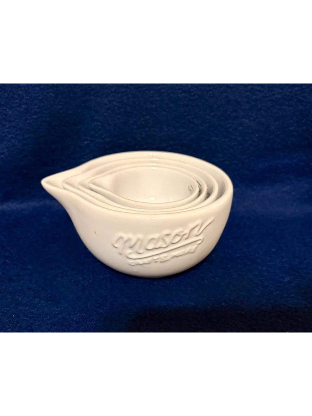 Mason Craft and More Stacking Ceramic Measuring Cups with Spouts Pouring Liquid